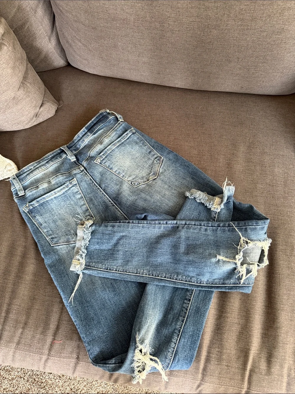 Ripped Light Blue Skinny Jeans with Button-Fly